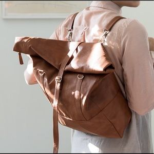 sleek brown VEGAN leather travel backpack